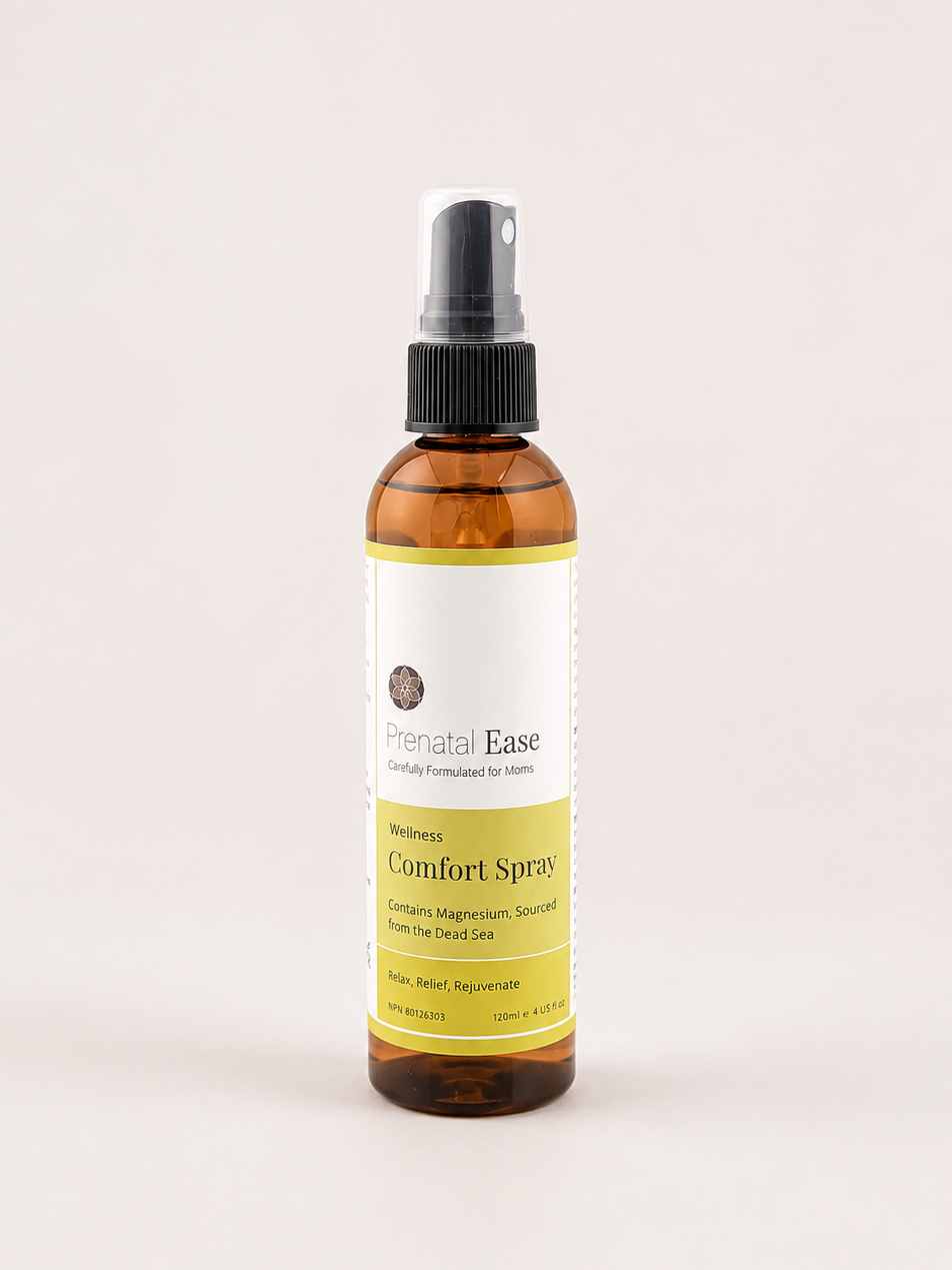 Bottle of Comfort Spray with a white label on a light pink background